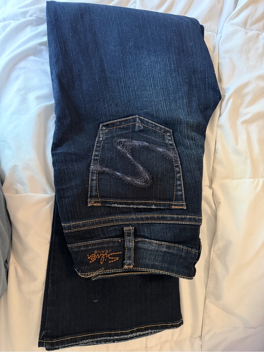 Silver Jeans Dark Indigo with Tan Stitching